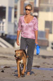 th_09240_Preppie_-_Charlize_Theron_takes_a_stroll_with_her_dogs_on_the_beach_in_Malibu_-_August_16_2009_137_122_236lo.jpg